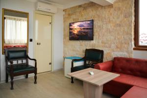 Posezení v ubytování Elite Holiday Hotel + 37 fotografií