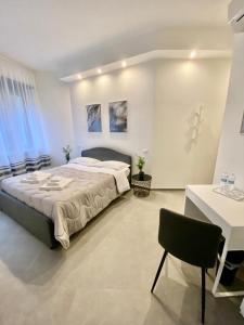 Postel nebo postele na pokoji v ubytování Residenza Via Verdi