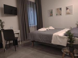 Postel nebo postele na pokoji v ubytování Residenza Via Verdi