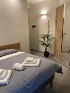 Postel nebo postele na pokoji v ubytování Residenza Via Verdi