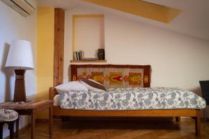 Posteľ alebo postele v izbe v ubytovaní Kolory Guest House