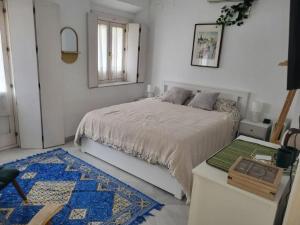Postel nebo postele na pokoji v ubytování WakeUp SevillaApartment