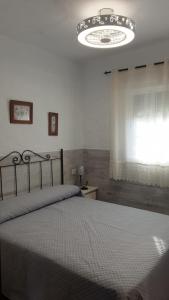 Posteľ alebo postele v izbe v ubytovaní Casa del Almendro