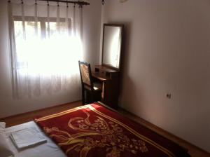 Postel nebo postele na pokoji v ubytování Apartmani Čempres Senj
