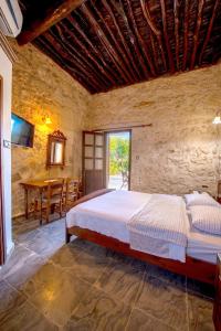 Postel nebo postele na pokoji v ubytování Revaklı Ev Guest House