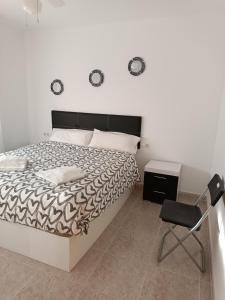 Postel nebo postele na pokoji v ubytování Playa, Port Aventura, Golf, wifi y Parking