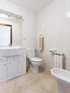 Koupelna v ubytování Apartamentos Granxola