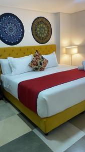 Cama o camas de una habitación en Hotel Bogota Resort