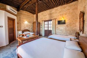 Postel nebo postele na pokoji v ubytování Revaklı Ev Guest House