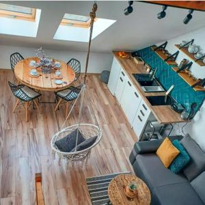 Posezení v ubytování Loft Żuławy, apartament na wyłączność