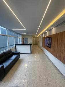 TV a/nebo společenská místnost v ubytování Hotel Solar Paulista