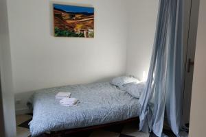 Posteľ alebo postele v izbe v ubytovaní Appartement 2 pièces proche cathédrale