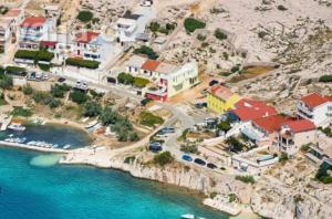 an aerial view of a resort on a beach at Apartments Sweet Dreams in Zubovići