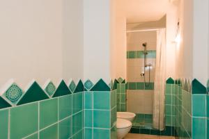 A bathroom at Apartment in S'Abba e Sa Pedra with pool