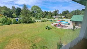 Bazén v ubytování Hotel Diego de Almagro Osorno nebo v jeho okolí
