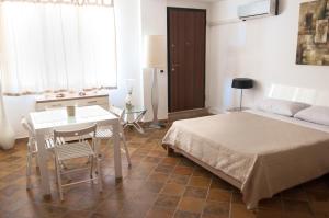 Postel nebo postele na pokoji v ubytování Guest House del Lido