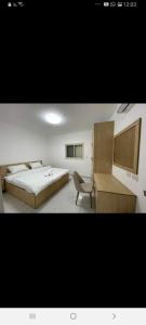 Postel nebo postele na pokoji v ubytování סוויטות לב הגולן - Golan center suite