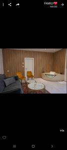 Postel nebo postele na pokoji v ubytování סוויטות לב הגולן - Golan center suite