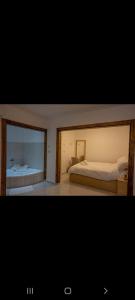 Postel nebo postele na pokoji v ubytování סוויטות לב הגולן - Golan center suite