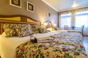 Cama ou camas em um quarto em Hotel Recanto da Serra