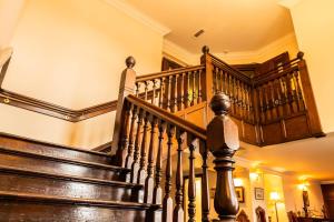 an image of a staircase in a house at The Bridge Helmsdale in Helmsdale