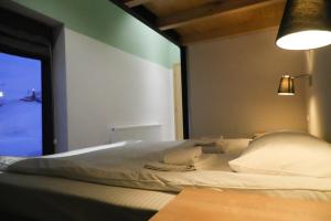 Llit o llits en una habitació de Khada Hostel