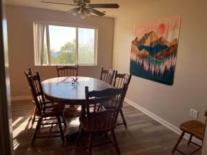 a dining room with a table and chairs at Hidden Views B Duplex in Twain Harte