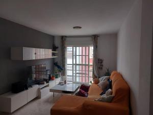 Posezení v ubytování Piso céntrico de dos dormitorios