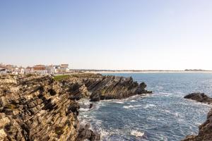 a view of the ocean from a rocky cliff at Pillows Peniche B&B in Peniche