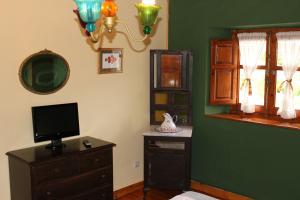 Μια τηλεόραση ή/και κέντρο ψυχαγωγίας στο Casa vacacional Valles Pasiegos