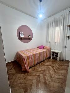 Posteľ alebo postele v izbe v ubytovaní Casa Loli - solo familias y parejas