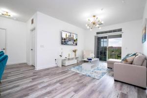 Et opholdsområde på Your Orlando home 15 min to Disney - KGG01