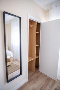 Кровать или кровати в номере SAMIL PLAYA SUR