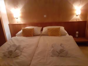Posteľ alebo postele v izbe v ubytovaní Hotel Gold