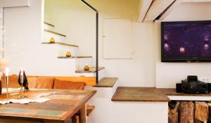 Televízia a/alebo spoločenská miestnosť v ubytovaní Clauhomes Casa Rural Deluxe