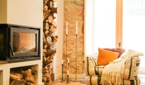 Televízia a/alebo spoločenská miestnosť v ubytovaní Clauhomes Casa Rural Deluxe