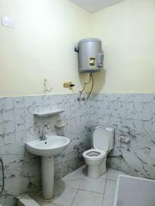 a bathroom with a toilet and a sink at Special Room in downtown Cairo in Cairo