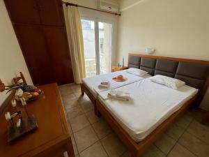 Posteľ alebo postele v izbe v ubytovaní Villa Meresi - Thassos Town Center + 36 fotografií