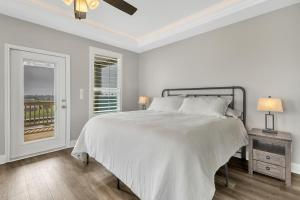 Ένα ή περισσότερα κρεβάτια σε δωμάτιο στο Fishermans Delight home +44 φωτογραφίες