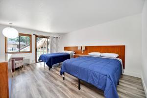 Amador Hotel tesisinde bir odada yatak veya yataklar