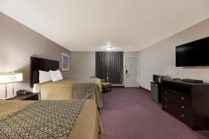 Postel nebo postele na pokoji v ubytování Americas Best Value Inn Alpine
