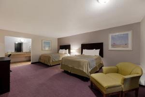 Postel nebo postele na pokoji v ubytování Americas Best Value Inn Alpine