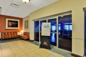 a lobby with a sign in the middle of a room at Daytona Beach Resort 803 in Daytona Beach