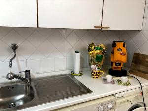 a kitchen counter with a sink and a mixer at Borgo Antico di Capri in Capri