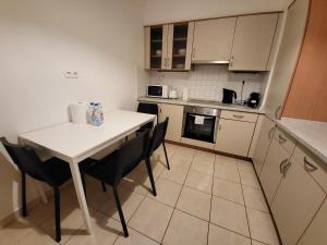 Kuchyňa alebo kuchynka v ubytovaní SDP Futo Apartment
