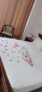 Postel nebo postele na pokoji v ubytování White Sand Villa - Beach front