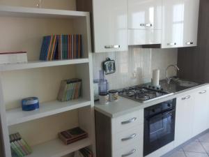 Η κουζίνα ή μικρή κουζίνα στο Conte Caramelli Apartment