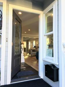 a front door of a house with a living room at 3813 Point Break home in Pacific Grove