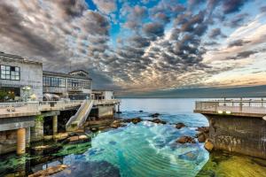 a view of the water near a pier at 3804 Mermaid Loft home in Pacific Grove
