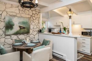 a kitchen and living room with a table and chairs at 3798 Cedar Place apts in Carmel
